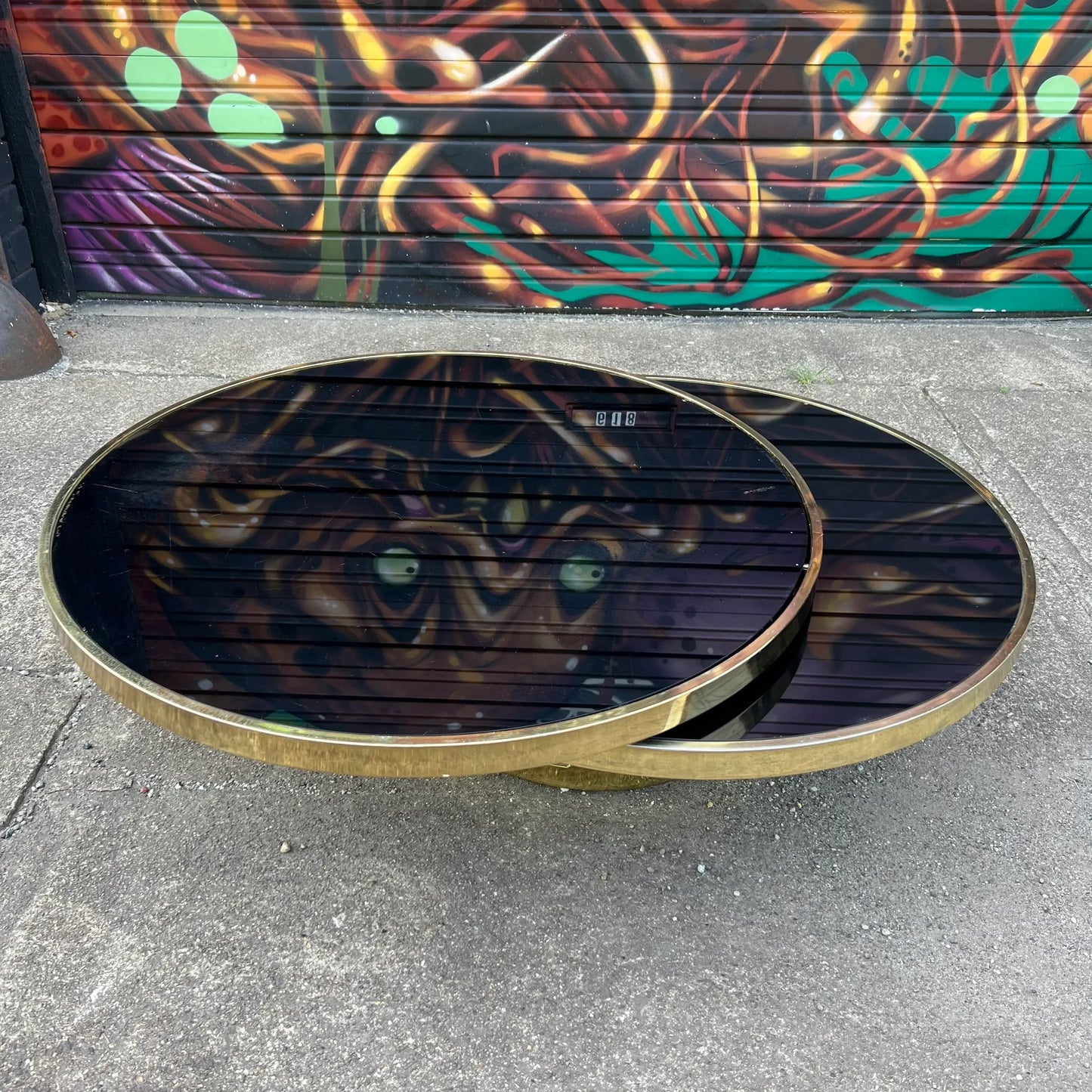 Milo Baughman Black Glass and Brass Two Tier Swivel Coffee Table