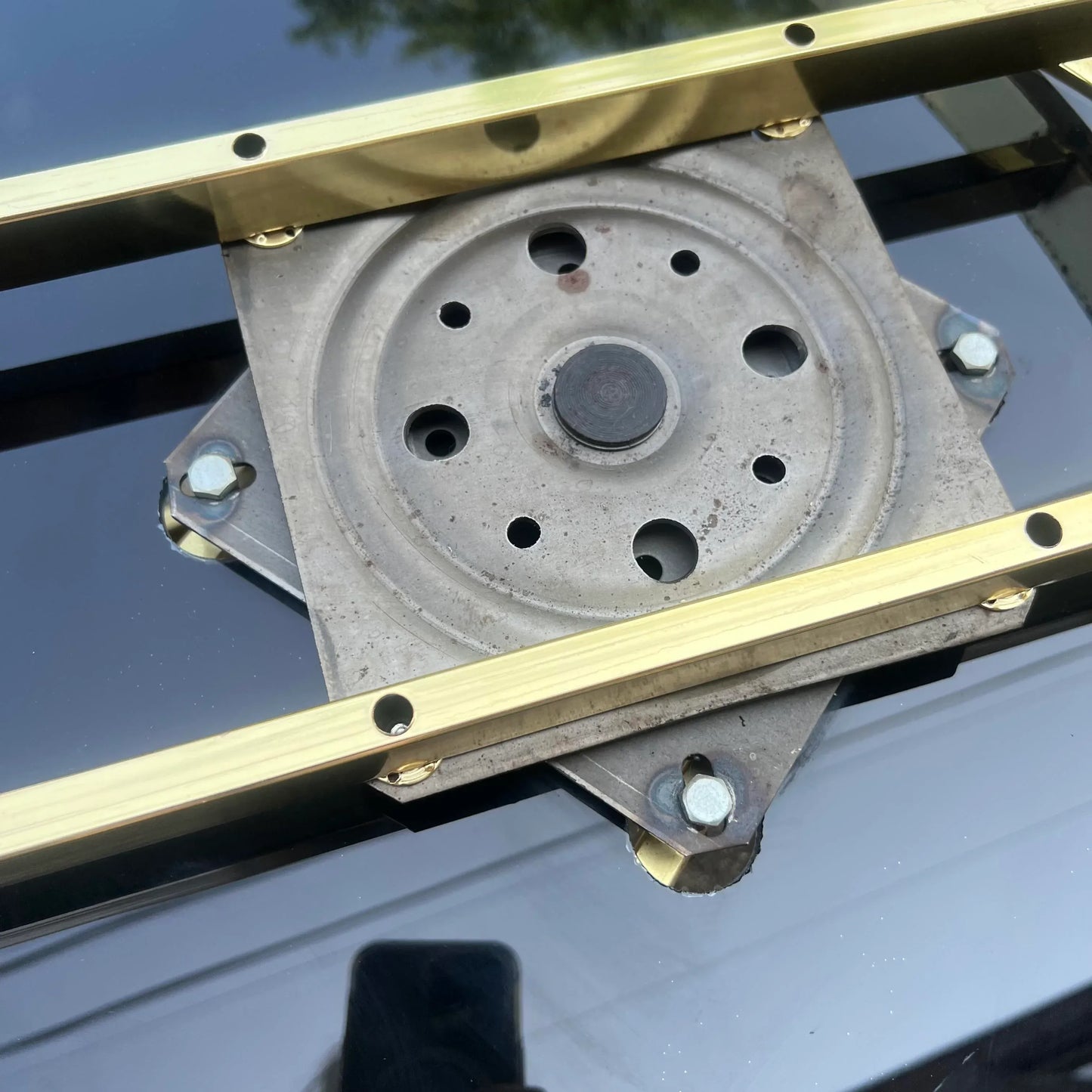 Milo Baughman Black Glass and Brass Two Tier Swivel Coffee Table