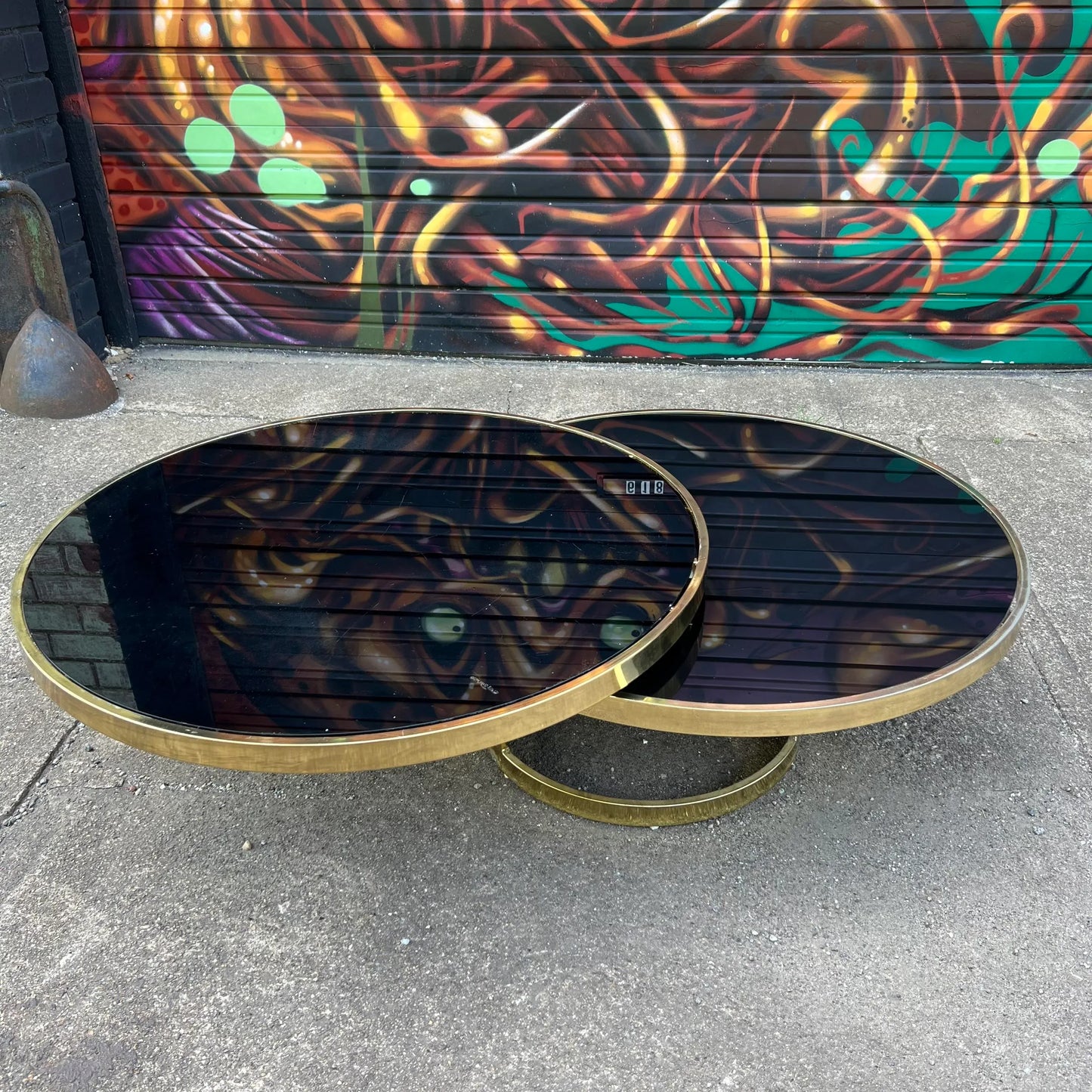 Milo Baughman Black Glass and Brass Two Tier Swivel Coffee Table
