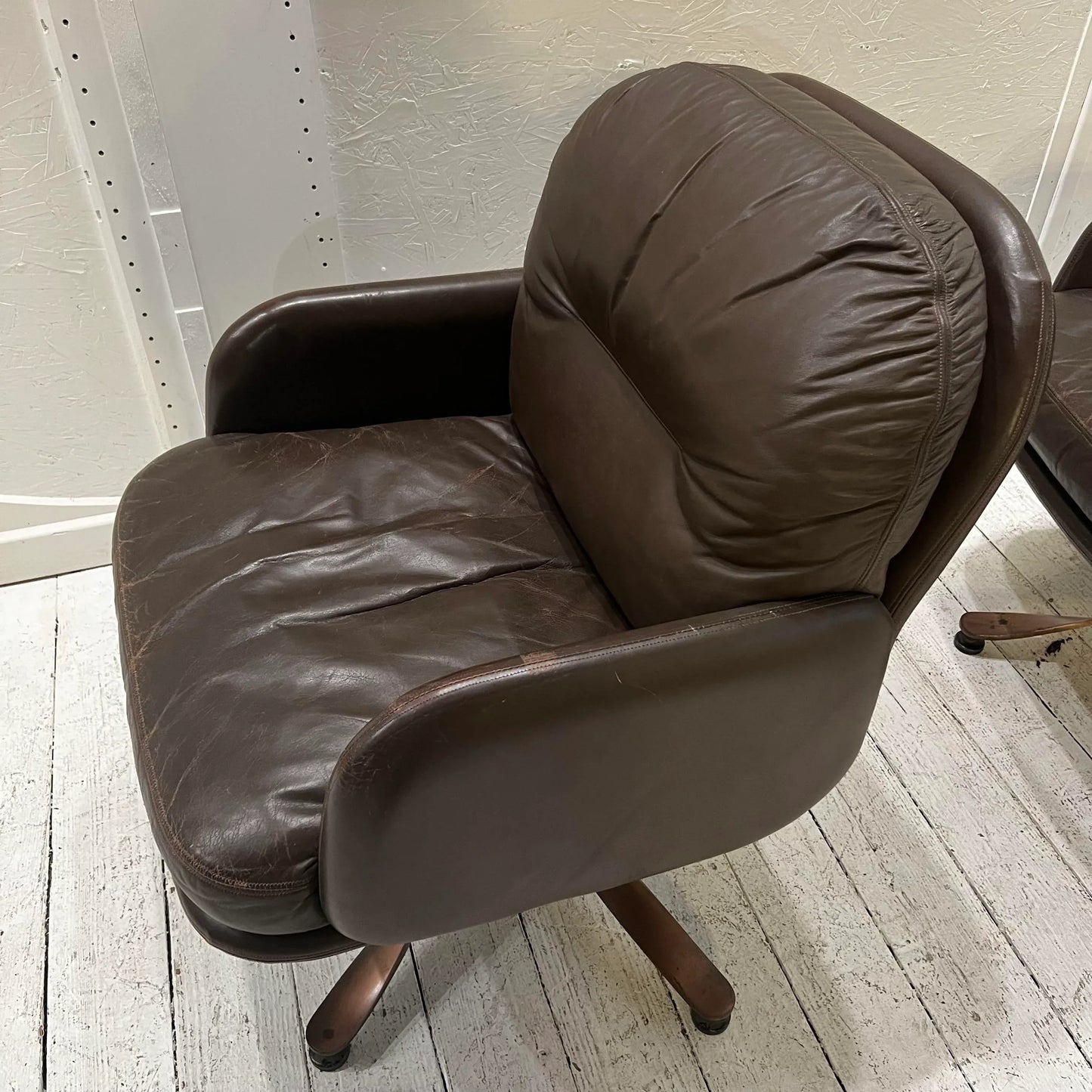 Brown Leather and Brass Propeller Base Arm Chairs by Mueller Furniture