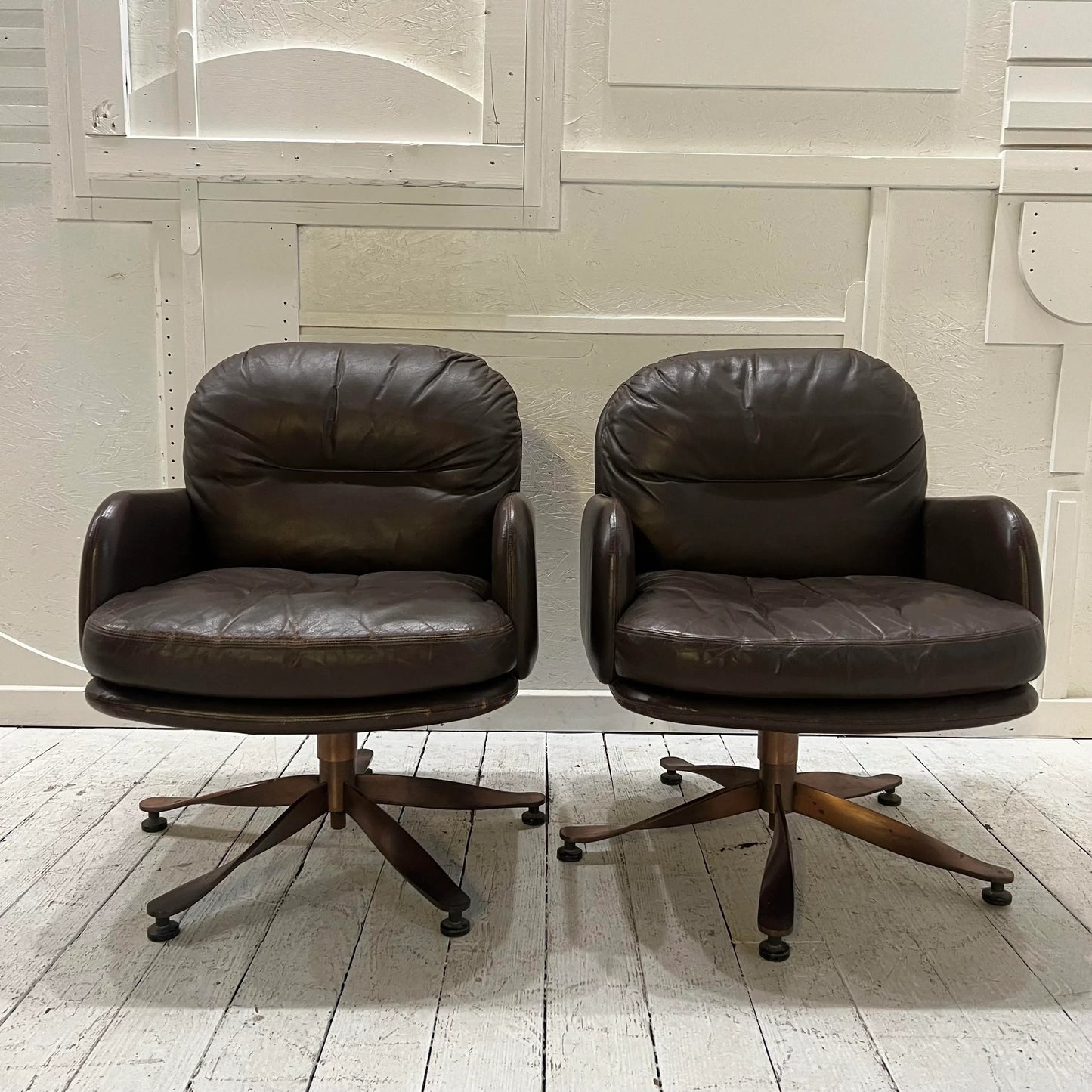 Brown Leather and Brass Propeller Base Arm Chairs by Mueller Furniture
