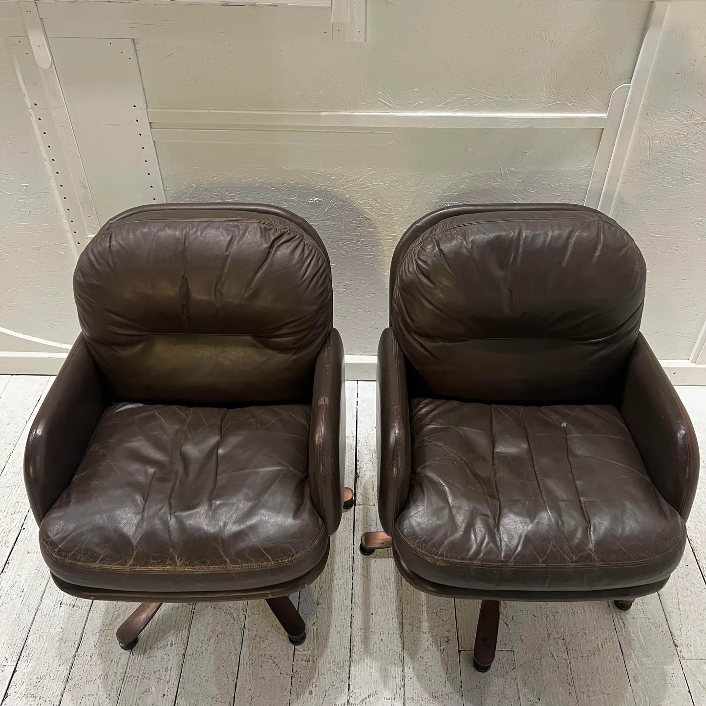 Brown Leather and Brass Propeller Base Arm Chairs by Mueller Furniture