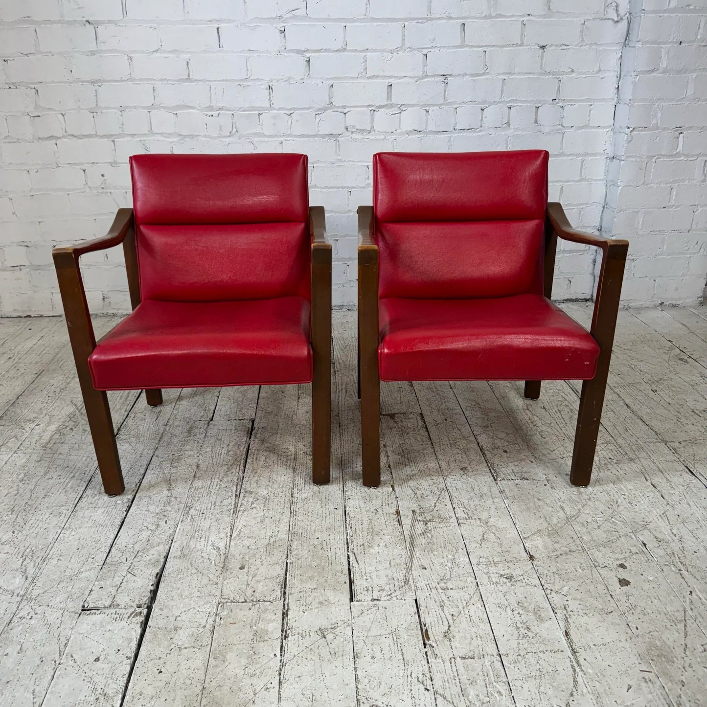 Mid Century Modern Pair of Red Vinyl Arm Chairs