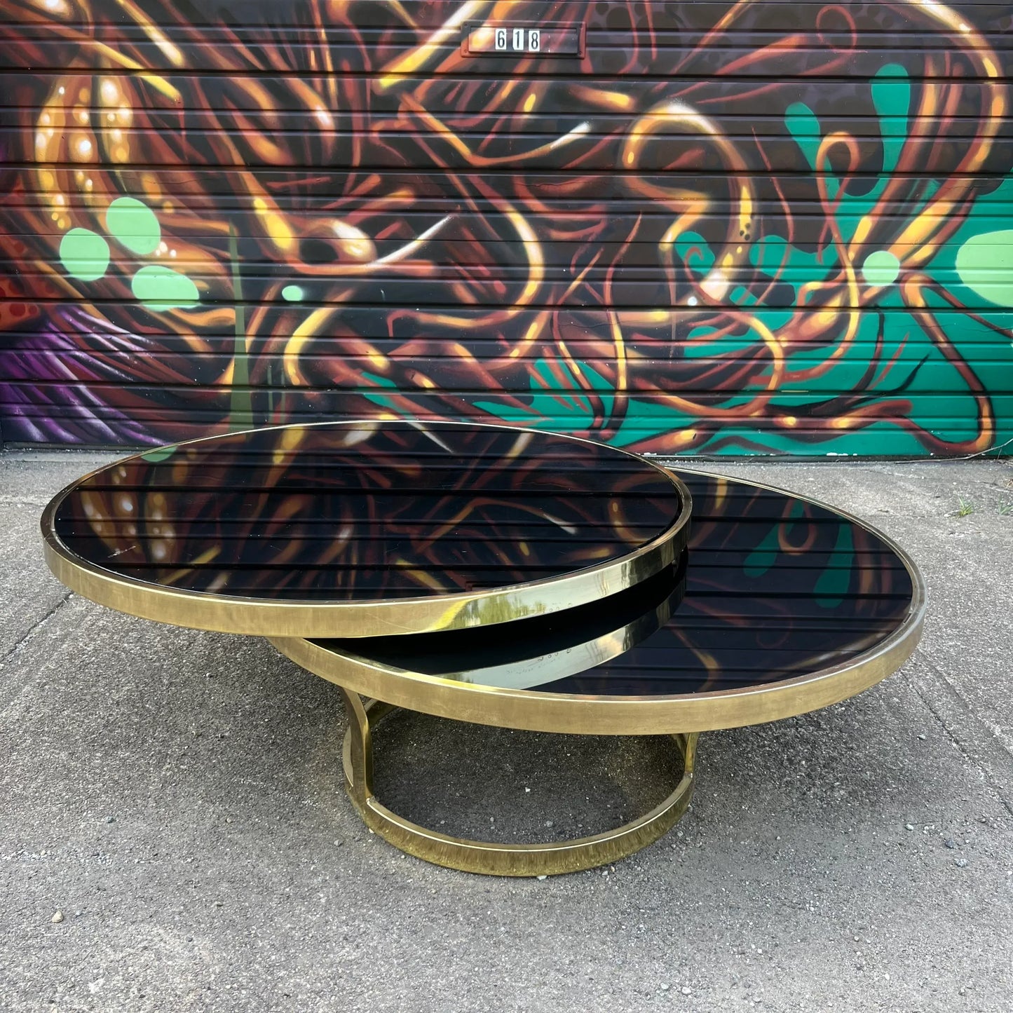 Milo Baughman Black Glass and Brass Two Tier Swivel Coffee Table