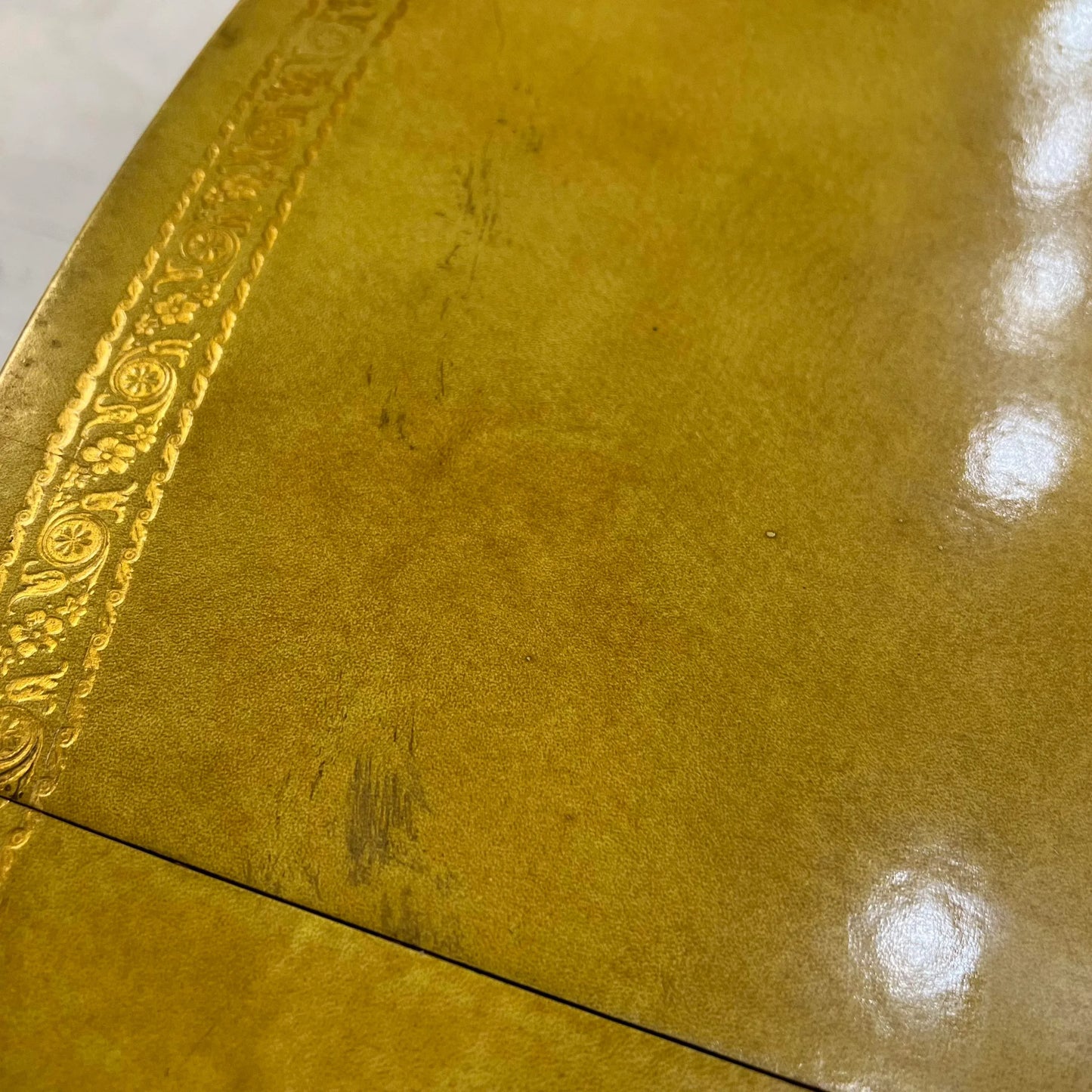 European Yellow Leather Wrapped Dining Table with Gold Trim