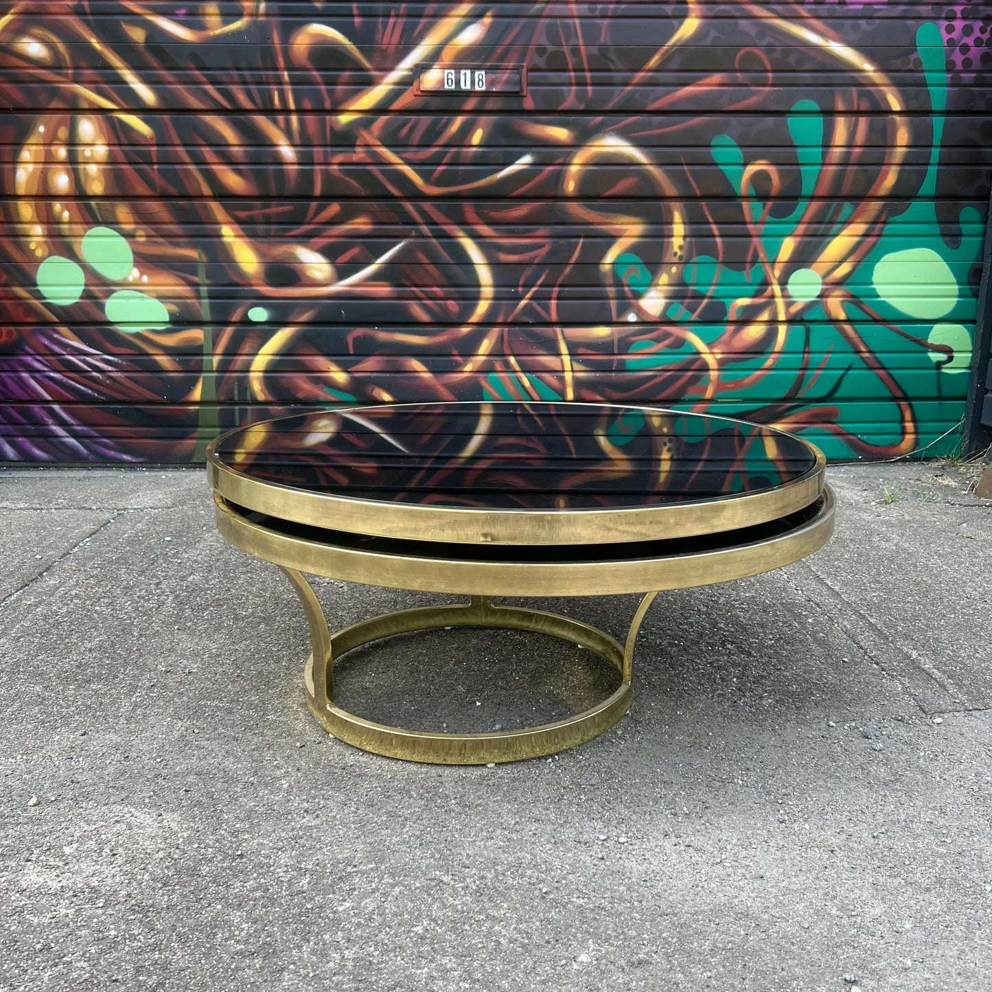 Milo Baughman Black Glass and Brass Two Tier Swivel Coffee Table