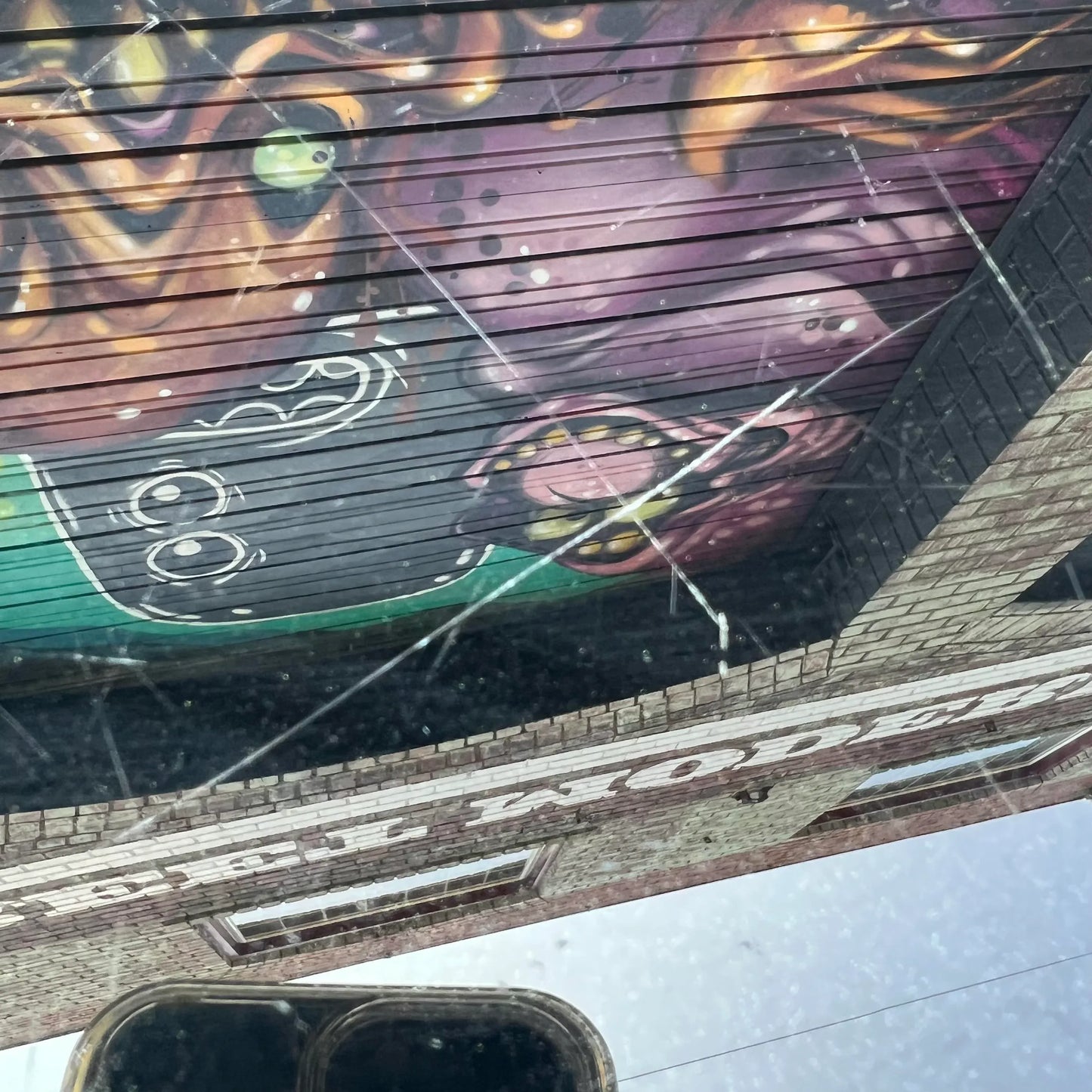 Milo Baughman Black Glass and Brass Two Tier Swivel Coffee Table