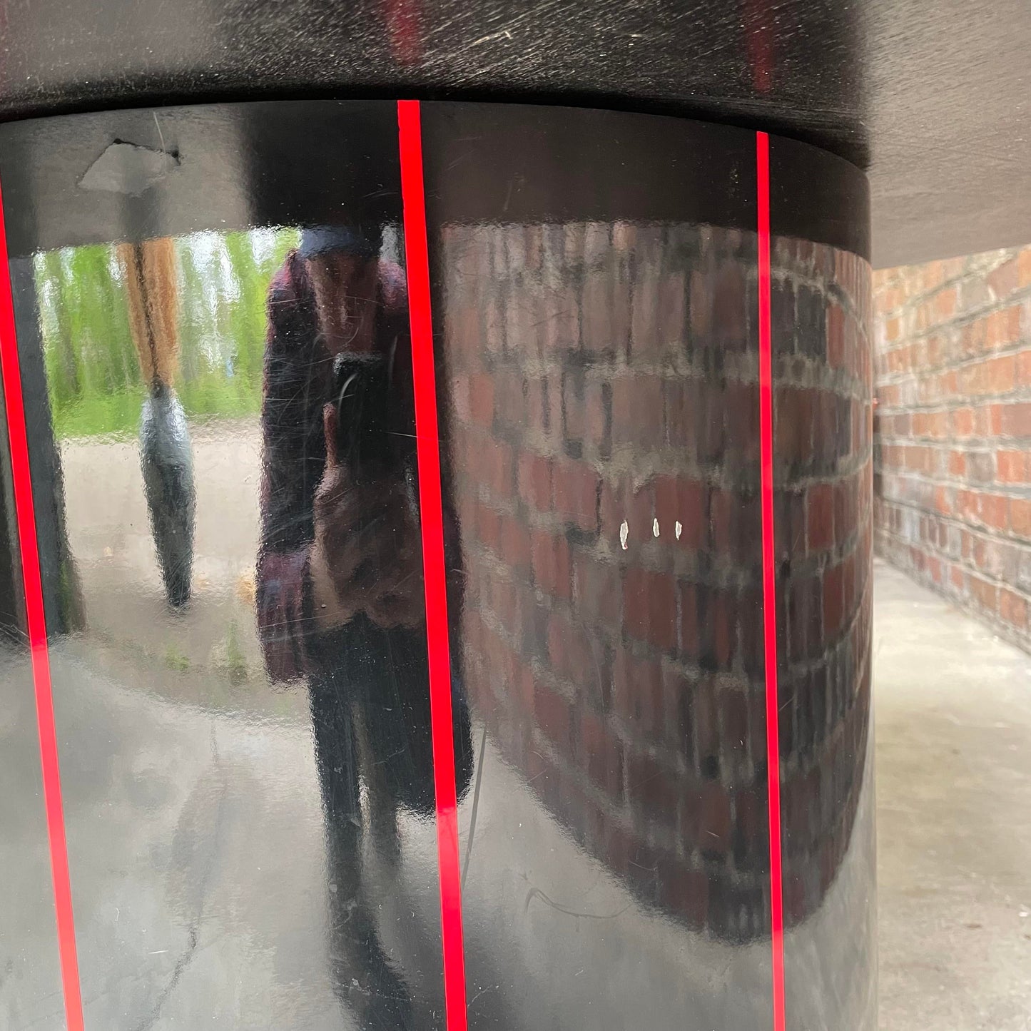 1980s Black Round Stone Table Top With Red Strips on Black Laminate Base Round