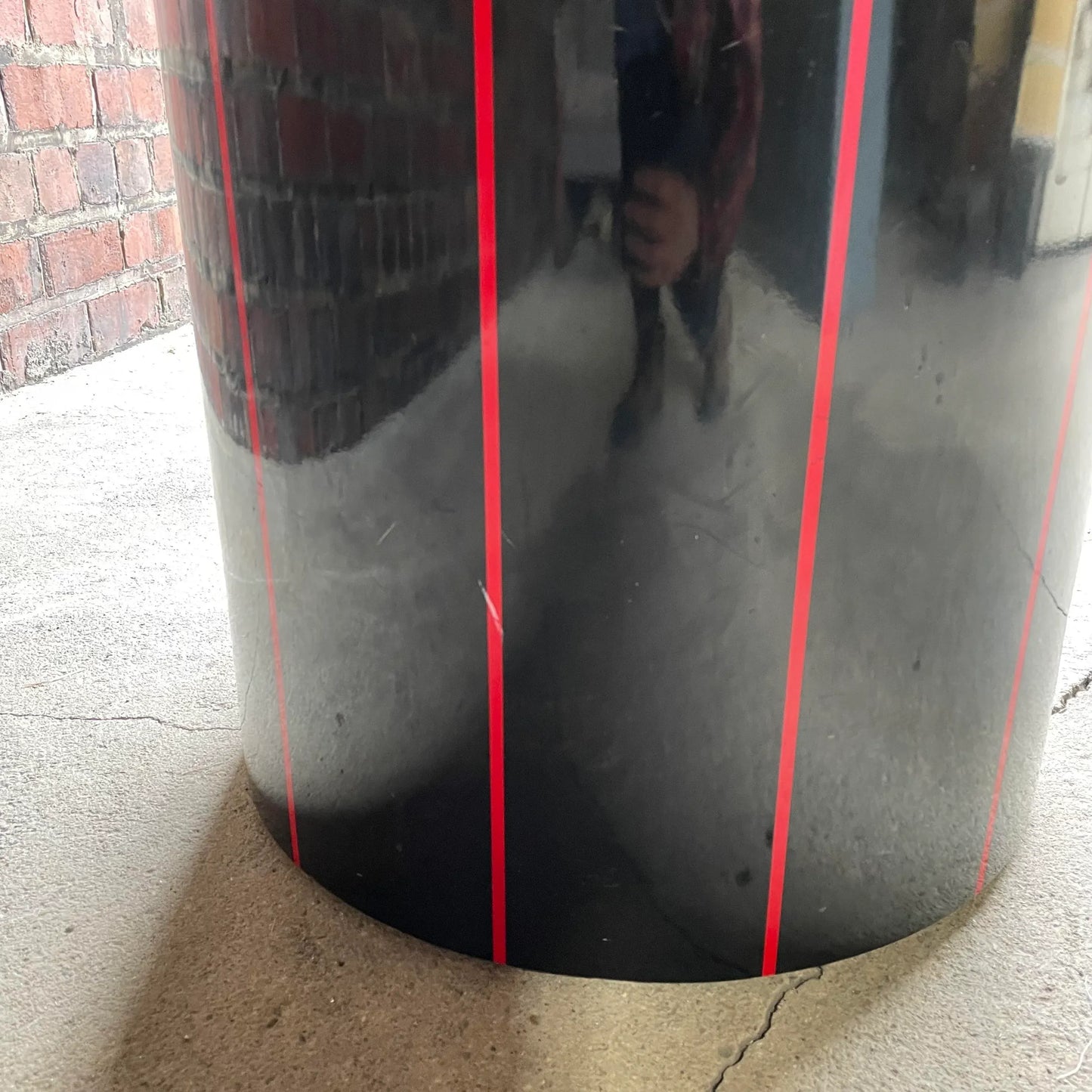 1980s Black Round Stone Table Top With Red Strips on Black Laminate Base Round