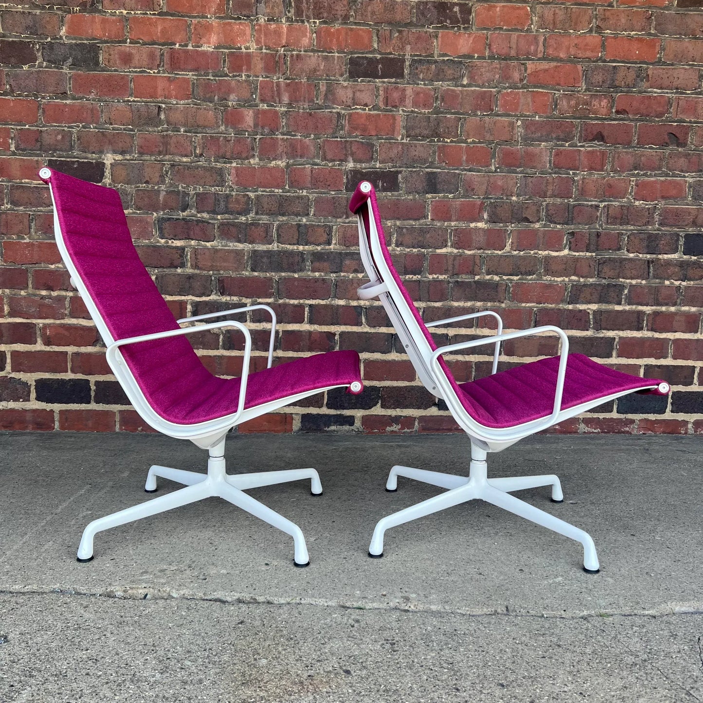Pair of Eames Herman Miller Aluminum Group Lounge Chairs White Frames and Pink Fabric
