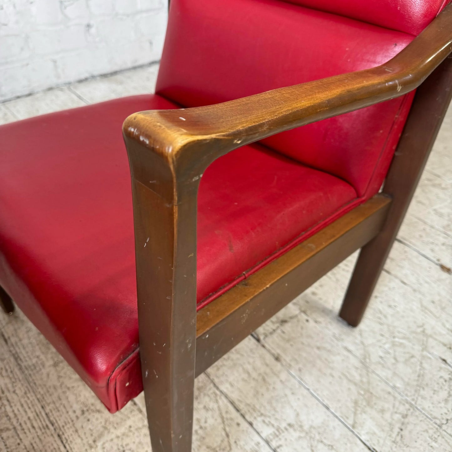 Mid Century Modern Pair of Red Vinyl Arm Chairs