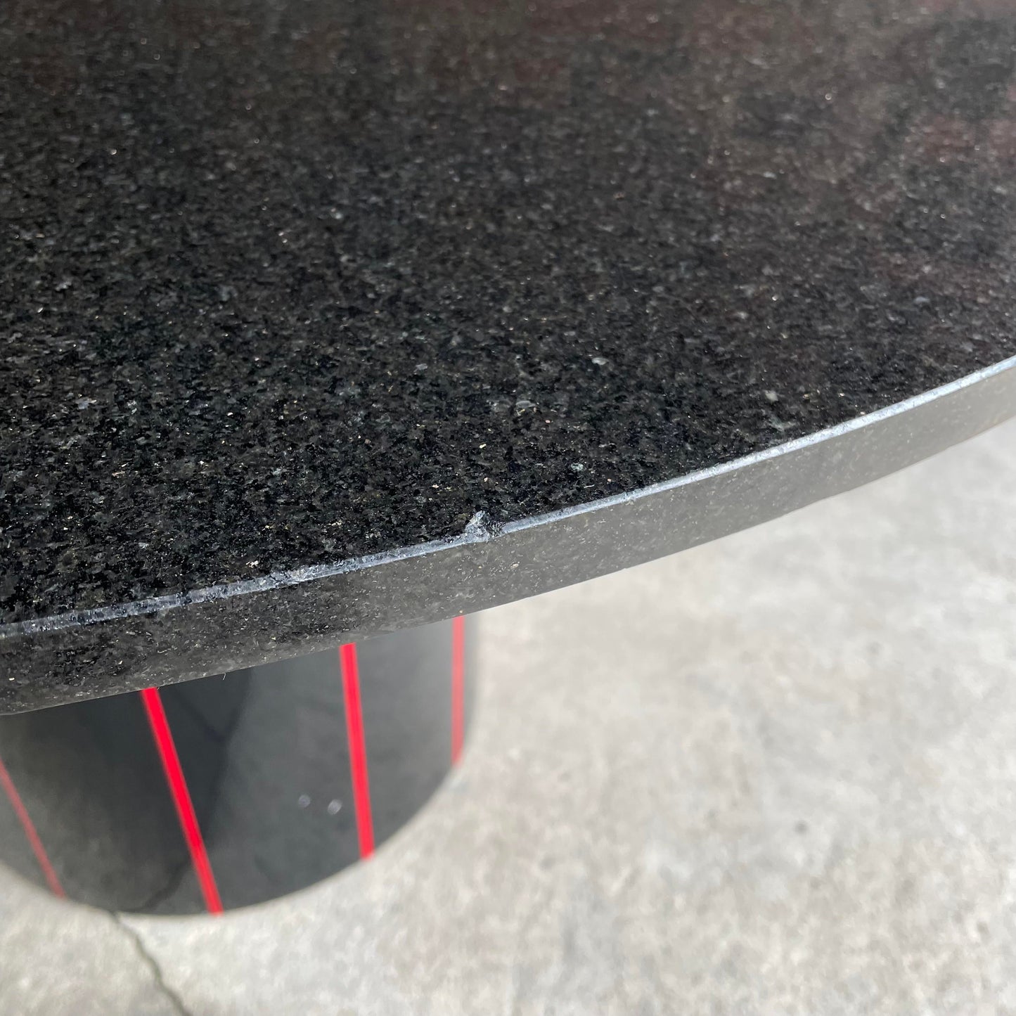1980s Black Round Stone Table Top With Red Strips on Black Laminate Base Round