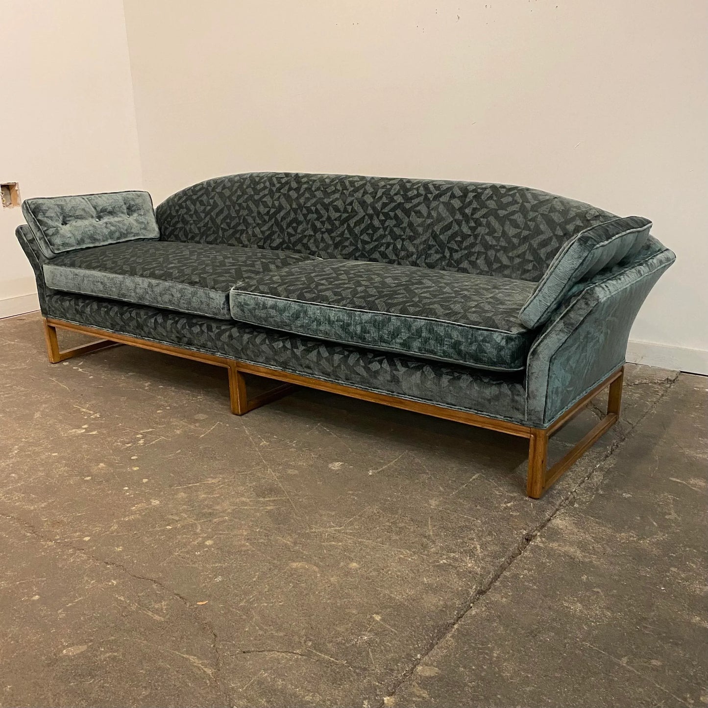 Reupholstered Mid Century Modern Sofa Done in a Geometric Cut Velvet.